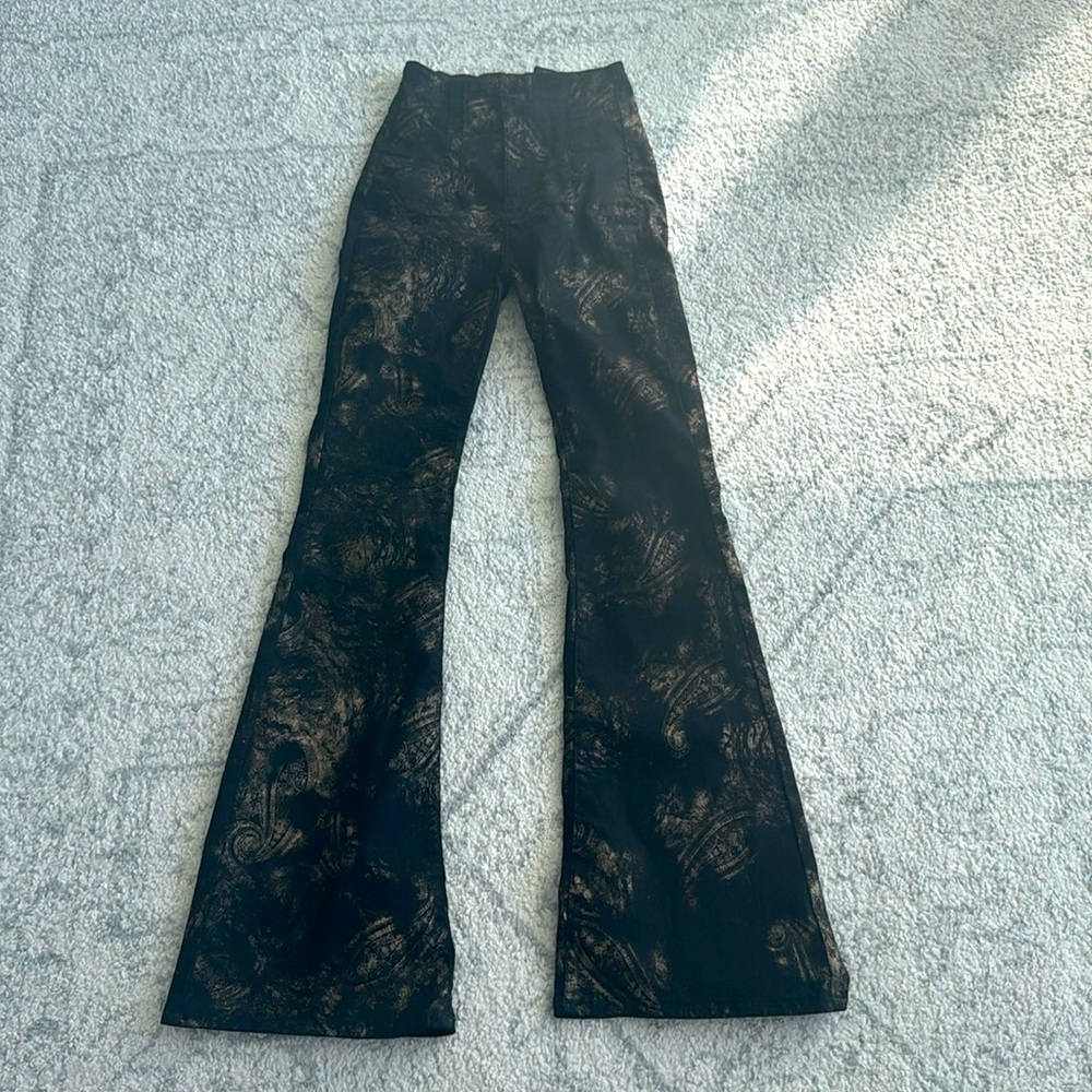 Free People size 26 “we the free” unique black and chrome pants.